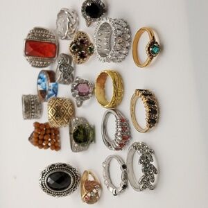 Twenty assorted rings and sizes